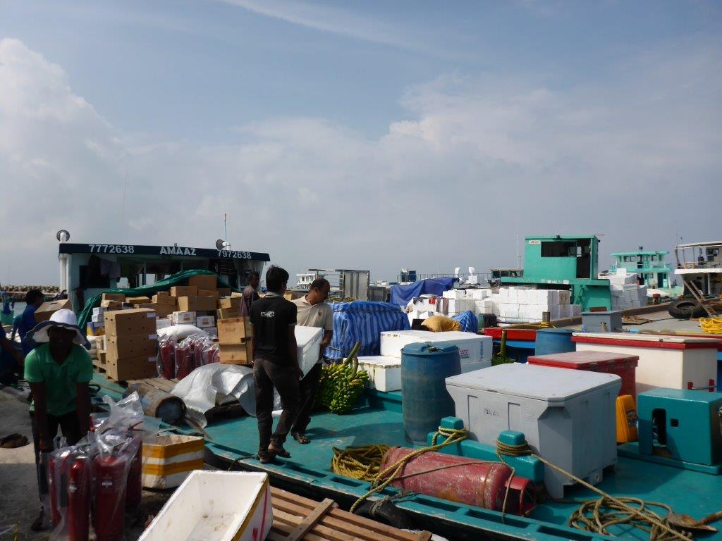 Ships loaded with goods at the commercial harbour.