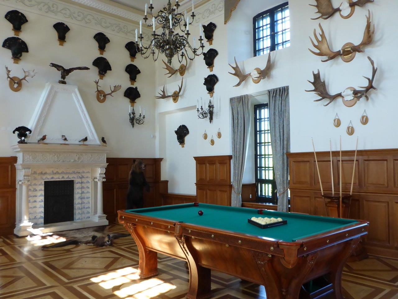 The hunting room in Niasvizh palace in Belarus with the pool table from 1896