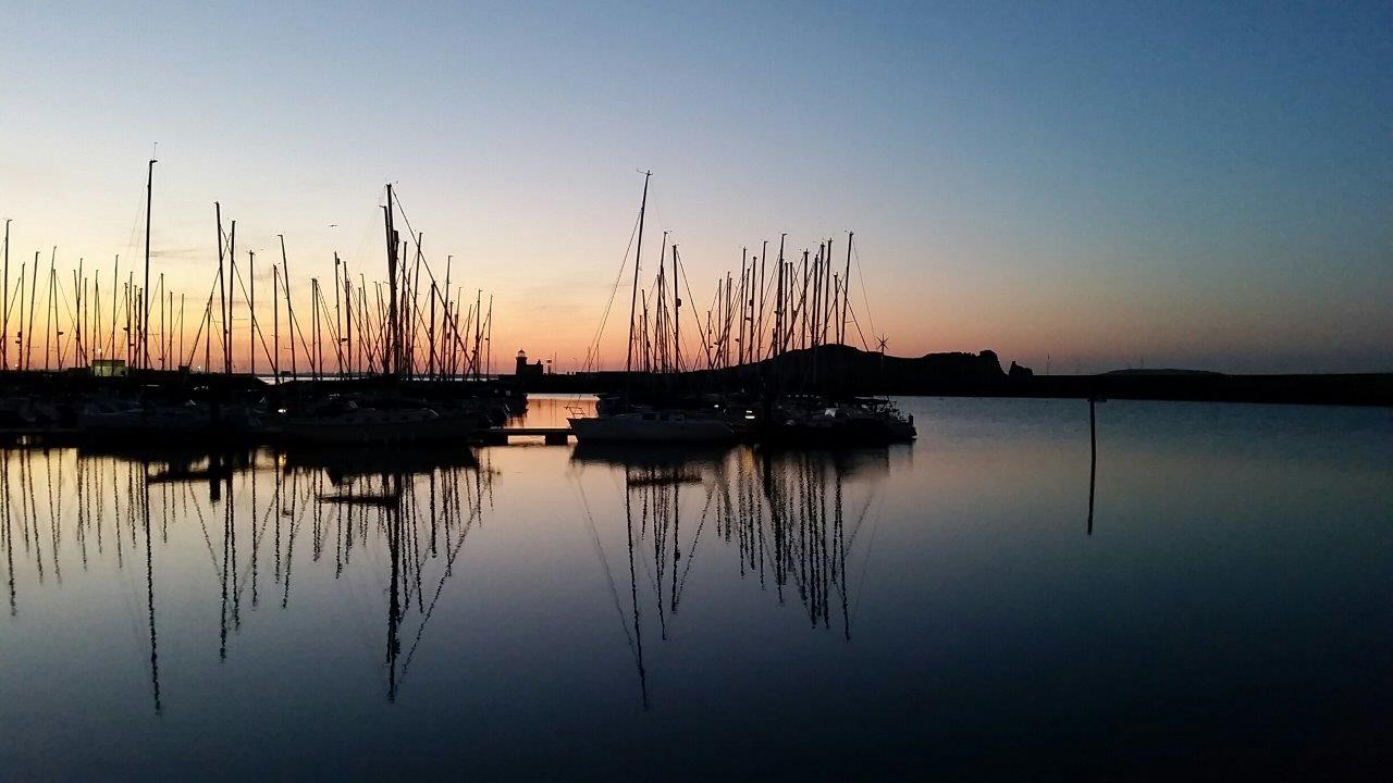 Sun is setting in Howth outside Dublin, Ireland