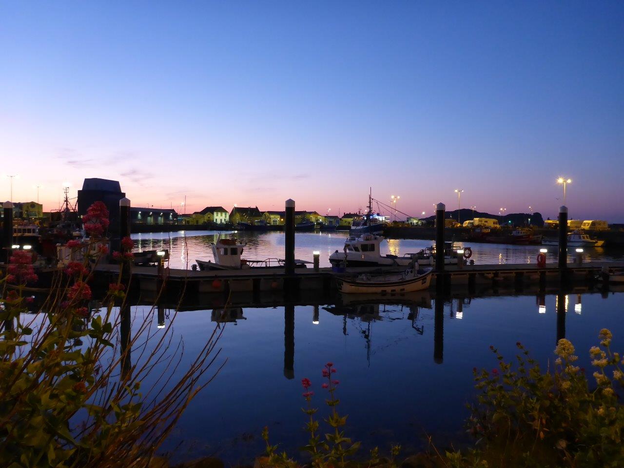 Sunset in the harbor in Howth outside Dublin, Ireland