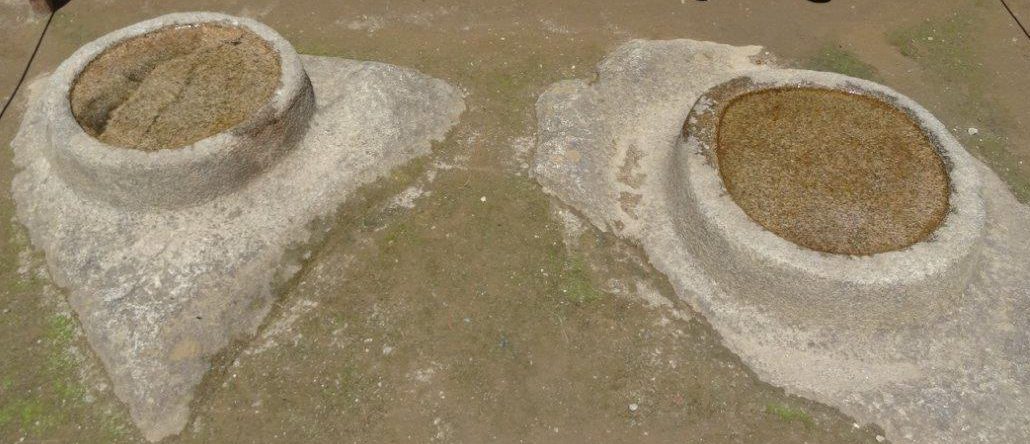 Two stones carved and filled with water; one reflecting the sun, the other the moon. Machu Picchu, Peru.