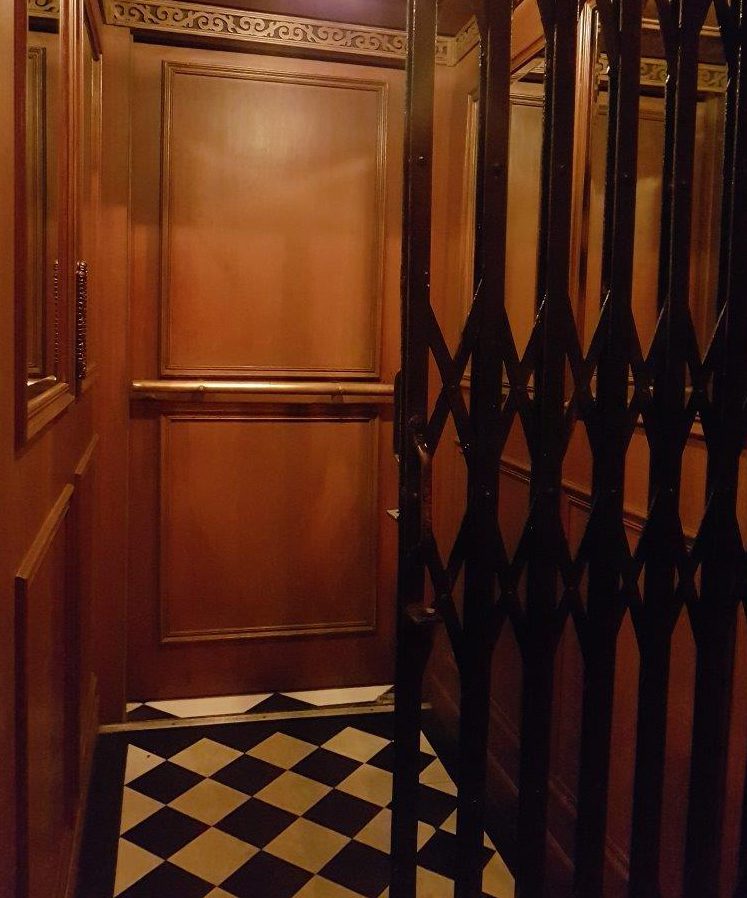 The entrance to ABV through an elevator. Speakeasy bar in Manila, Philippines