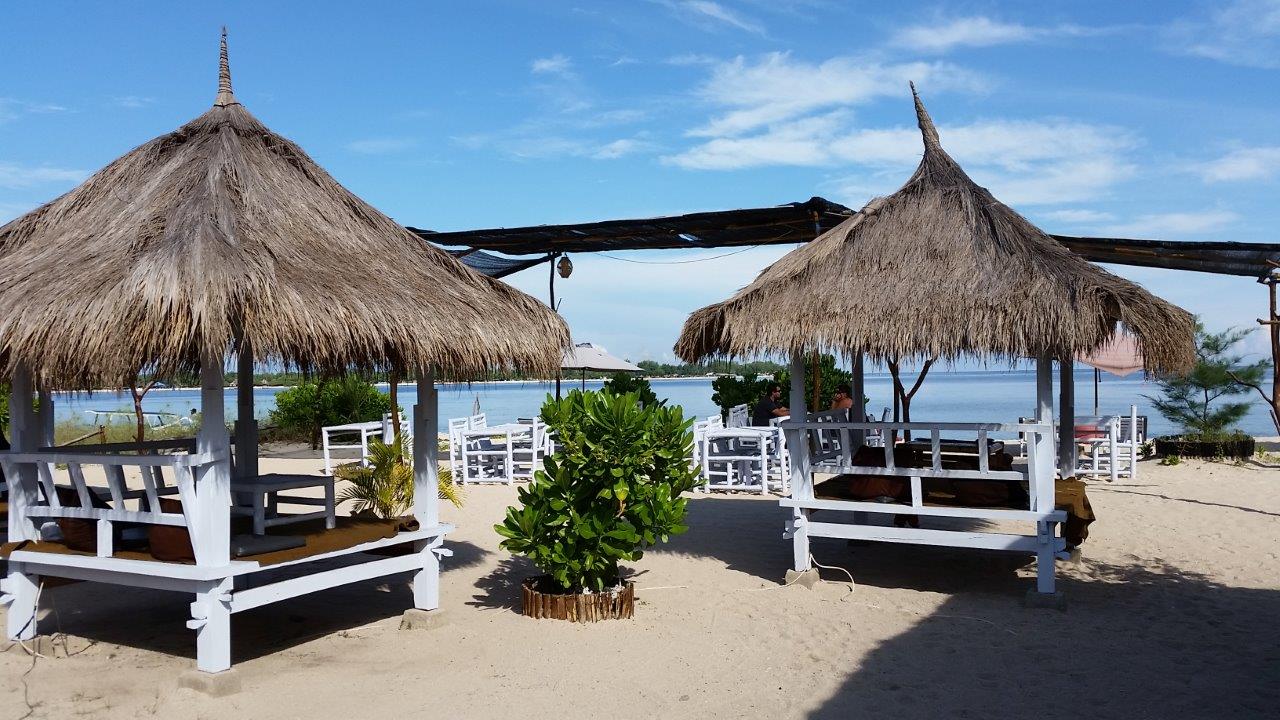 The nice restaurant and beach area at Sunset Beach Bungalows. Gili Meno island, Indonesia