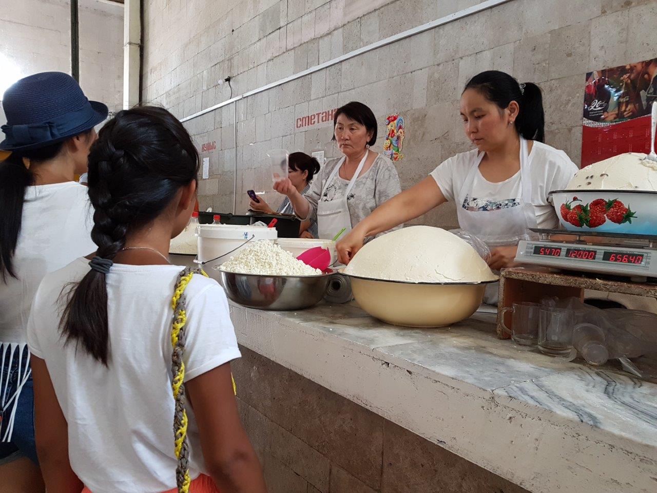 Byshtak - similar to cottage cheese. Osh Bazaar. Food tour in Bishkek, Kyrgyzstan