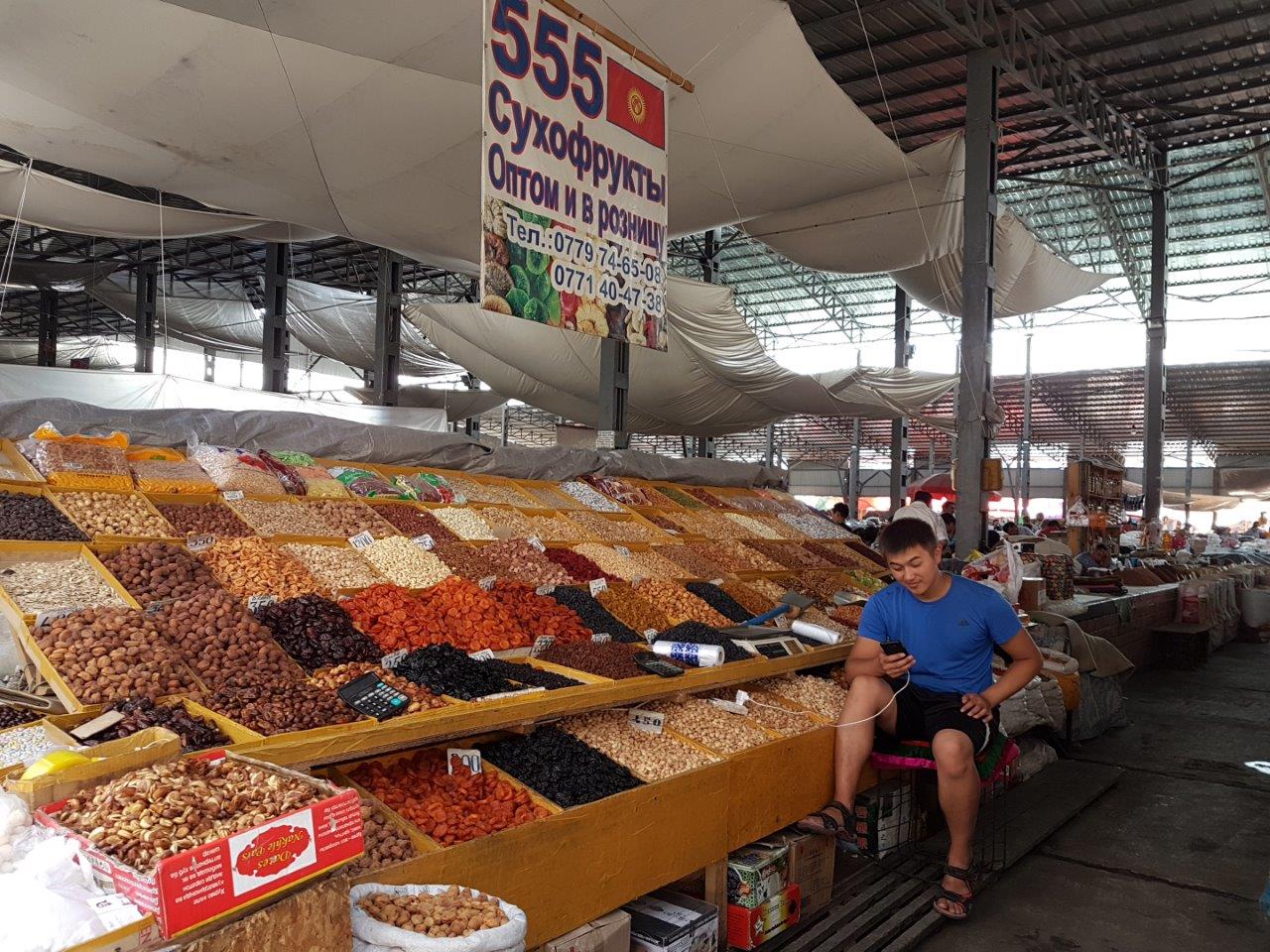 Dried fruites and nuts at Osh Bazaar. Food tour in Bishkek, Kyrgyzstan
