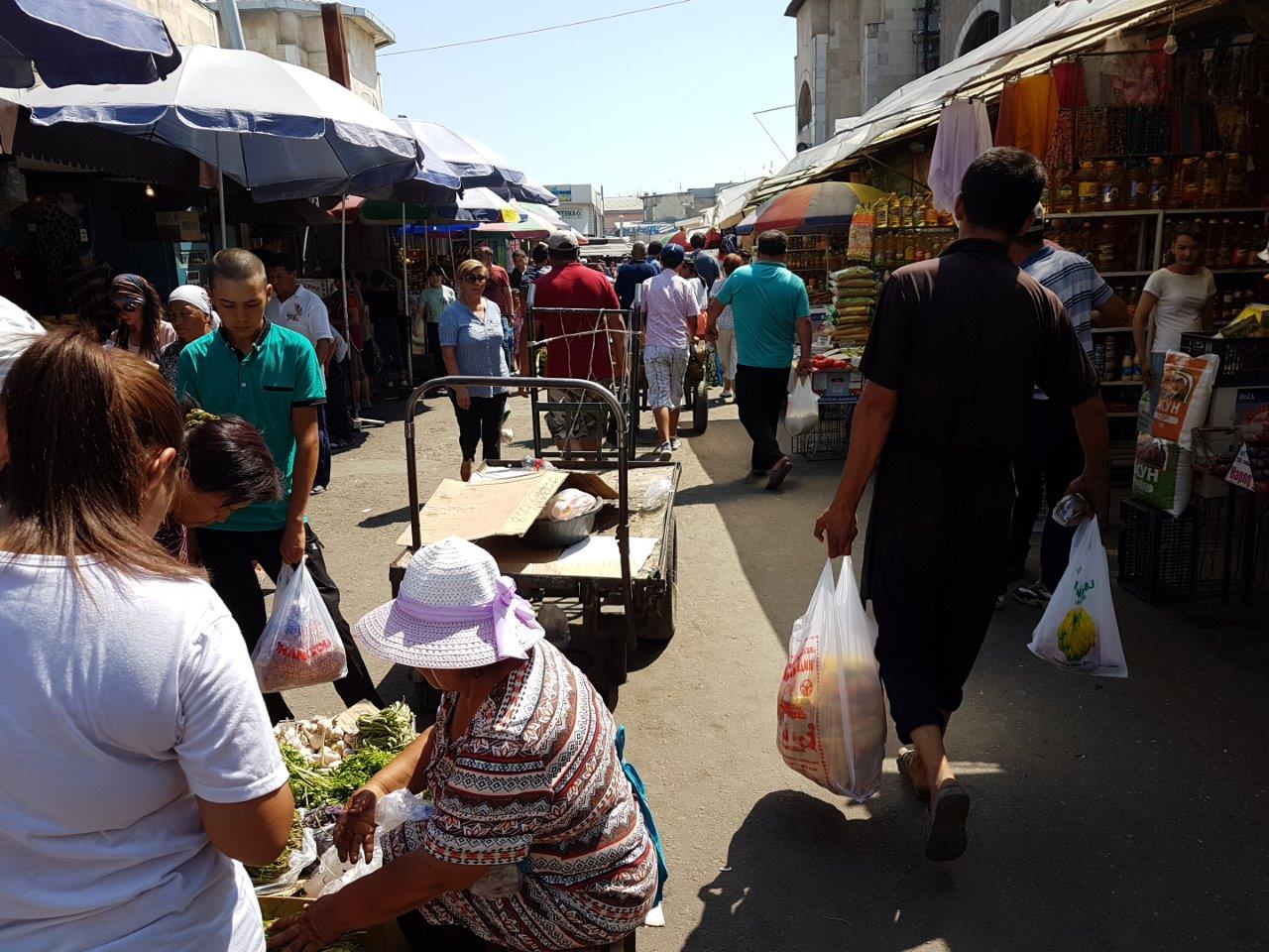Walking through Osh Bazaar. Food tour in Bishkek, Kyrgyzstan