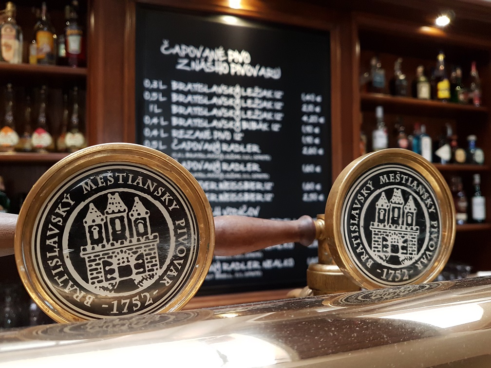 The bar at Meštiansky pivovar, a popular micro brewery. Food tour in Bratislava, Slovakia.